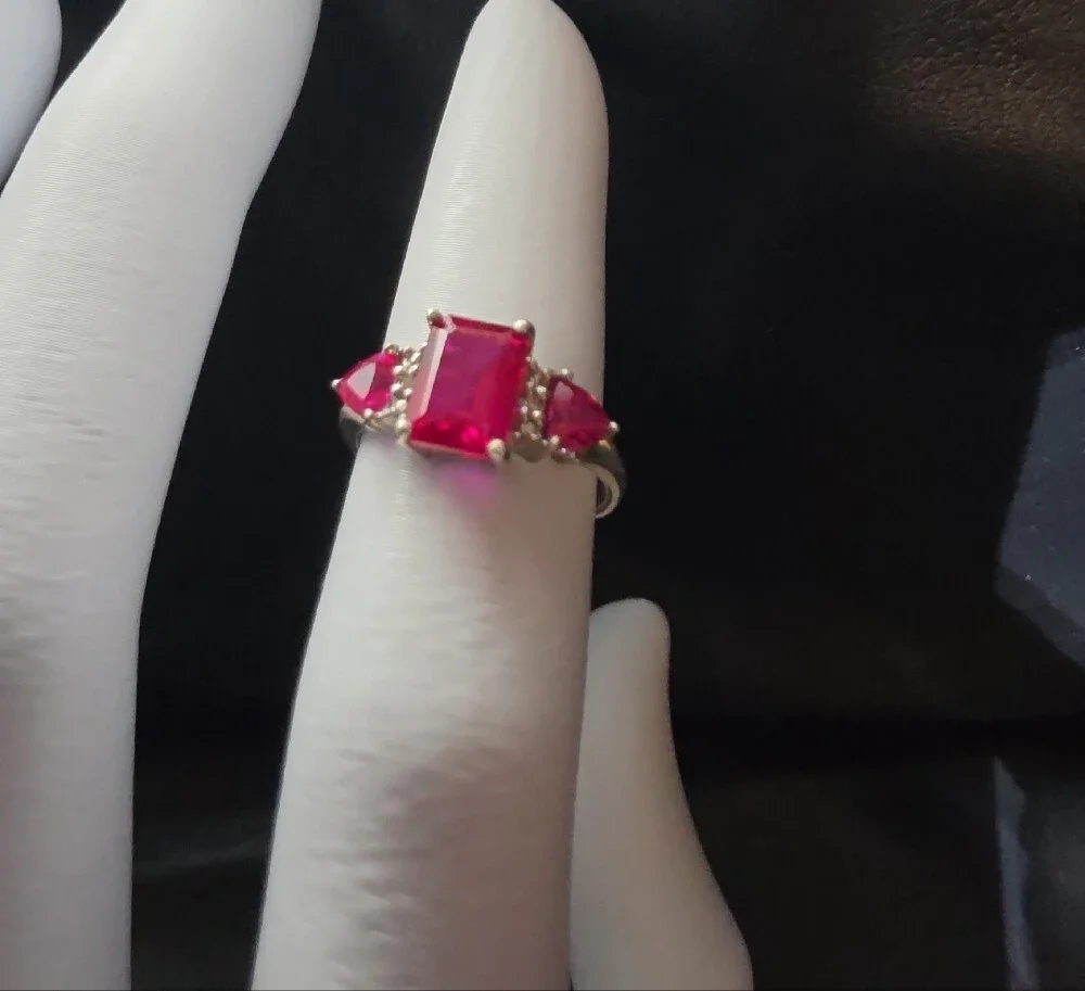 925 And Three-Stone Ruby Ring